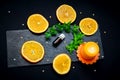 Citrus aroma oil concept Ã¢â¬â glass bottle with essence and orange slices